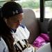 Saline junior Angel Schilke listens to music on the bus before the game against Mattawan on Tuesday, June 11. Daniel Brenner I AnnArbor.com